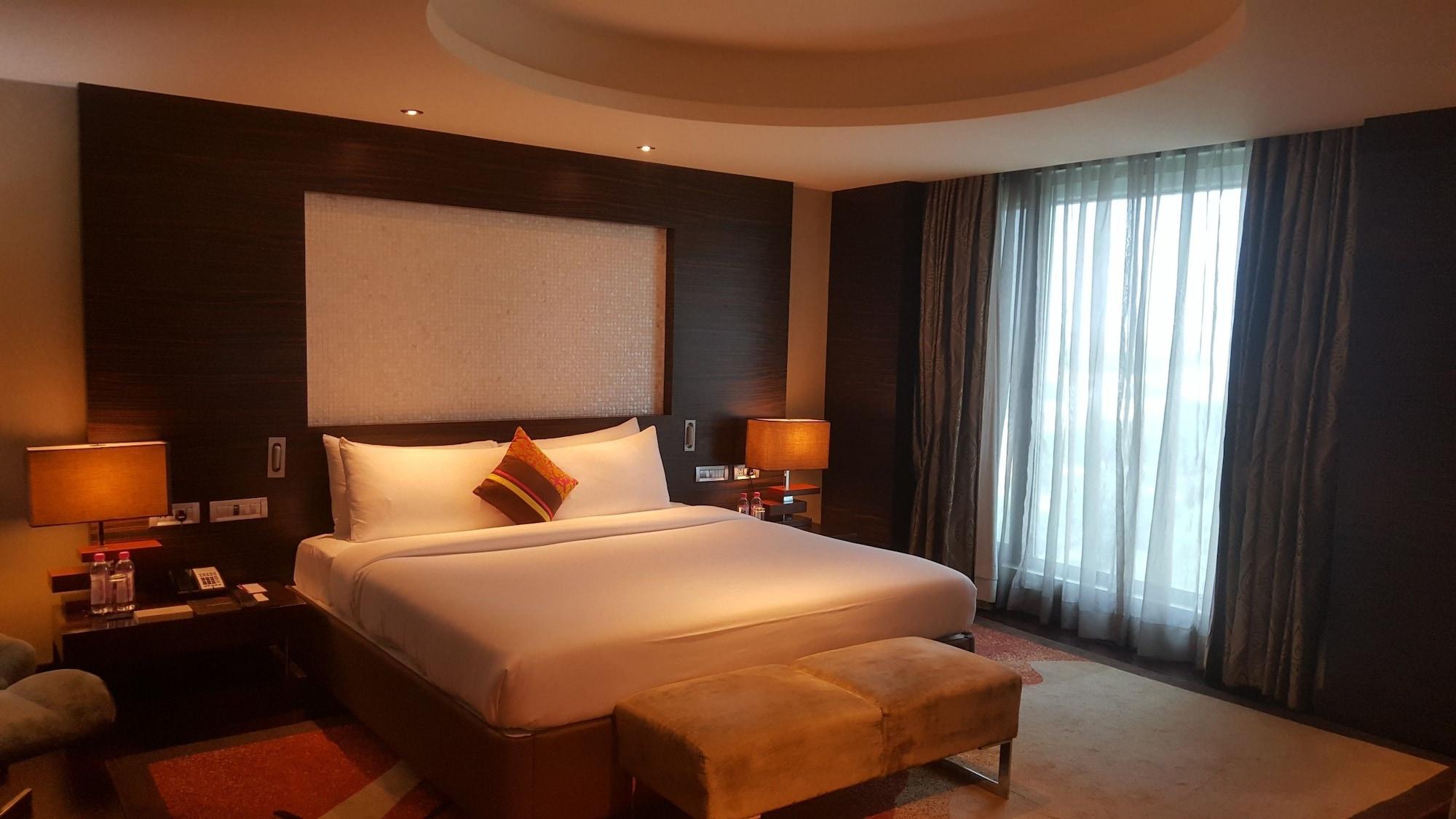 Vivanta Hyderabad, Begumpet Exteriör bild A bedroom at the Taj Bengal
